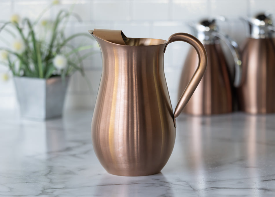 Bell Pitcher 2-Liter Stainless Steel Pitcher with Ice Guard in Rose Gold